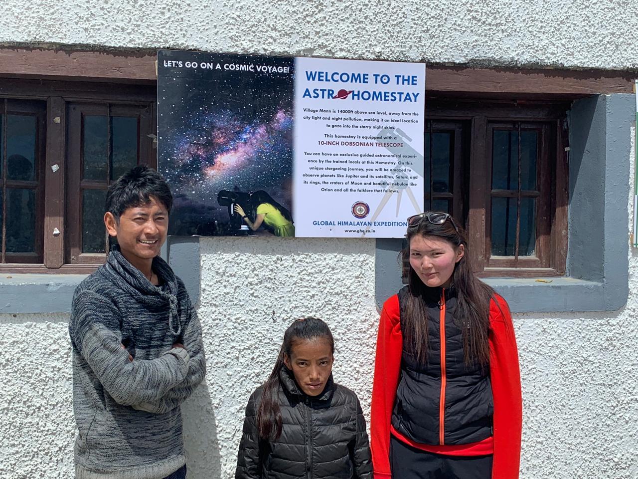 in front of the home with sign for stargazing